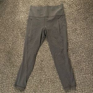 Athleta Salutation Stash Tight II 7/8 length size medium grey